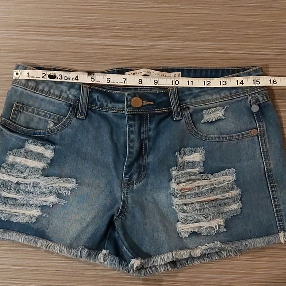 Distressed Denim Shorts by Romeo & Juliet Couture - Picture 3 of 13